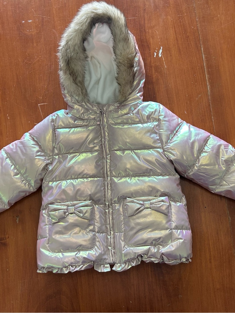 Iridescent Pink Puffer Jacket with Faux Fur Hood with Bow Pocket Detail